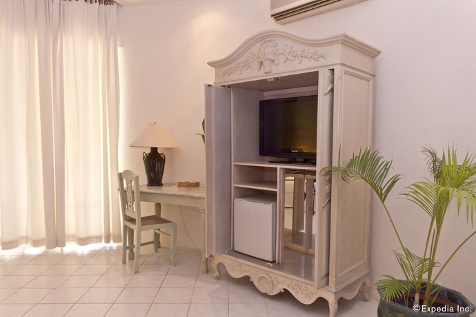 Imagen de la habitación del Hotel Cordova Reef Village Resort. Foto 13