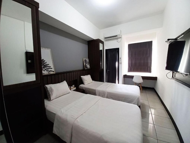 Imagen de la habitación del Hotel Cordova Suites. Foto 2