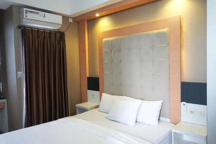 Imagen de la habitación del Hotel Cordova Suites. Foto 14