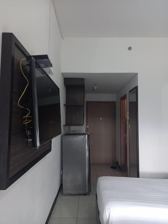 Imagen de la habitación del Hotel Cordova Suites. Foto 15