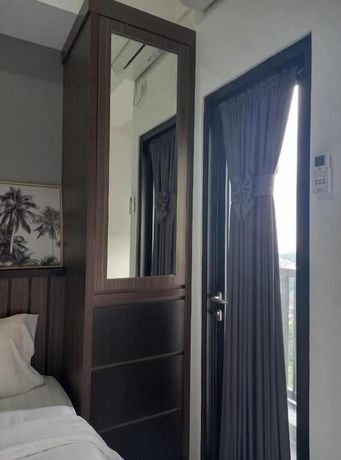Imagen de la habitación del Hotel Cordova Suites. Foto 16