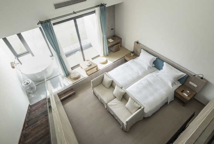 Imagen de la habitación del Hotel Core Fire Villafound Tongli. Foto 5