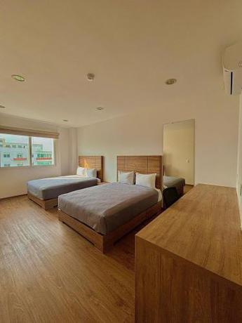 Imagen de la habitación del Hotel Core Suites. Foto 8
