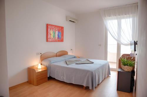 Imagen de la habitación del Hotel Corf&ugrave;, Pineto. Foto 6