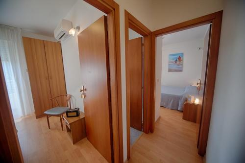 Imagen de la habitación del Hotel Corf&ugrave;, Pineto. Foto 7