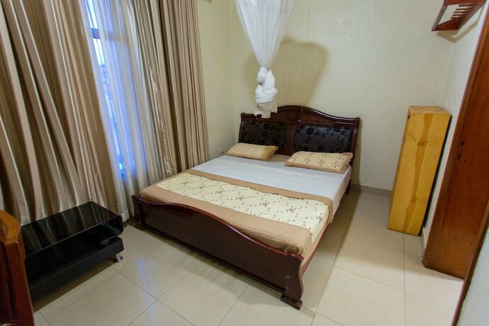 Imagen de la habitación del Hotel Corina K Guest House. Foto 19