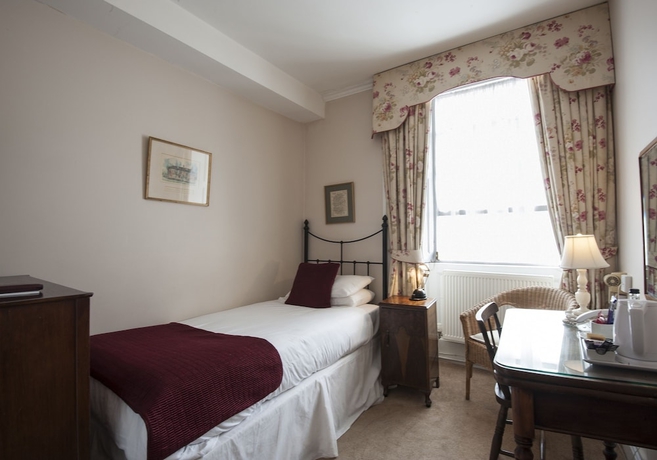 Imagen de la habitación del Hotel Corinium And Restaurant. Foto 10