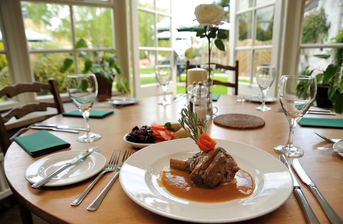 Imagen del bar/restaurante del Hotel Corinium And Restaurant. Foto 4