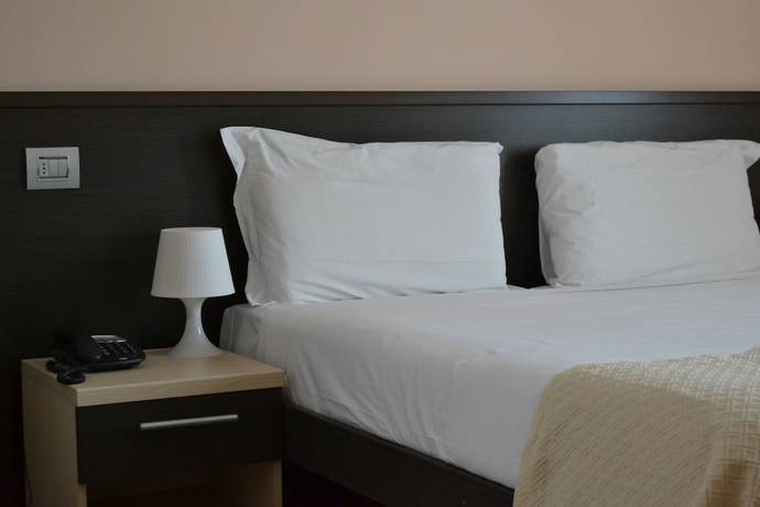 Imagen de la habitación del Hotel Cornelle. Foto 14