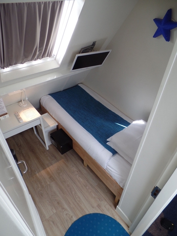 Imagen de la habitación del Hotel Corner House, Ámsterdam. Foto 2