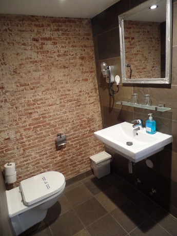 Imagen de la habitación del Hotel Corner House, Ámsterdam. Foto 5