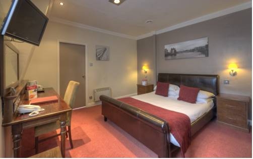 Imagen general del Hotel Corner House Inn By Good Night Inns. Foto 4