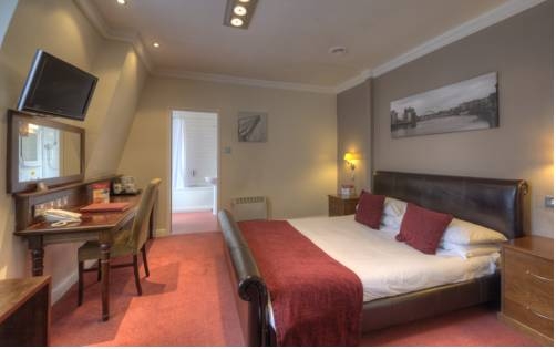 Imagen general del Hotel Corner House Inn By Good Night Inns. Foto 5