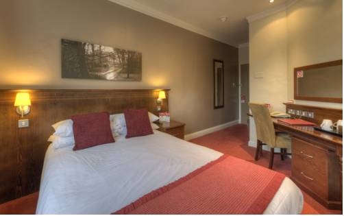Imagen general del Hotel Corner House Inn By Good Night Inns. Foto 6