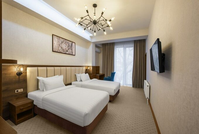 Imagen de la habitación del Hotel Corner Tashkent. Foto 12