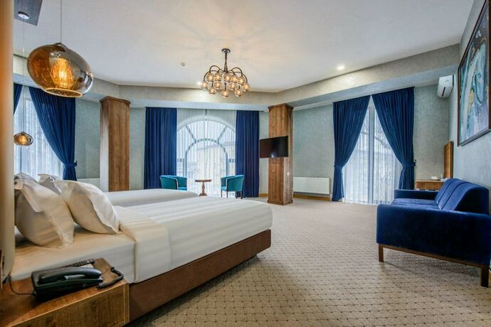 Imagen de la habitación del Hotel Corner Tashkent. Foto 13