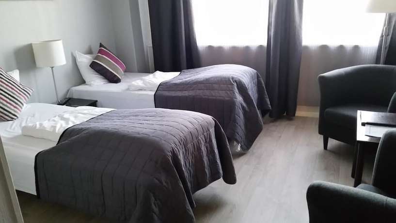 Imagen de la habitación del Hotel Cornerl. Foto 2
