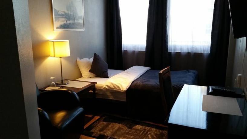 Imagen de la habitación del Hotel Cornerl. Foto 3
