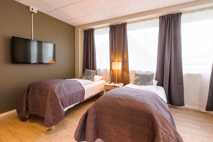 Imagen de la habitación del Hotel Cornerl. Foto 7