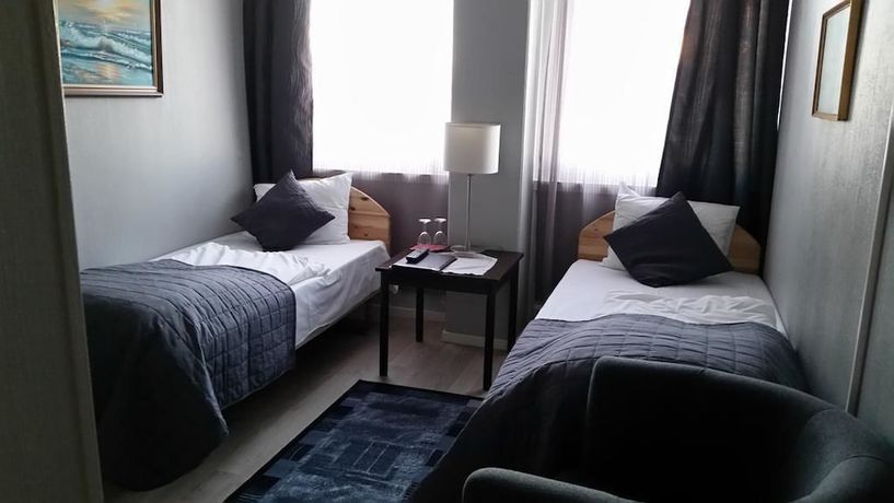 Imagen de la habitación del Hotel Cornerl. Foto 9
