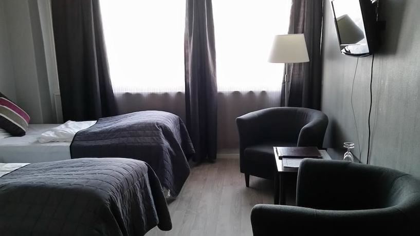 Imagen de la habitación del Hotel Cornerl. Foto 11