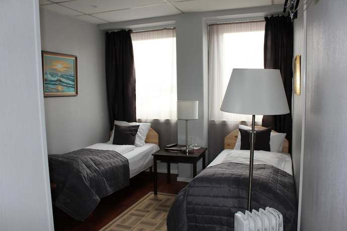 Imagen de la habitación del Hotel Cornerl. Foto 12