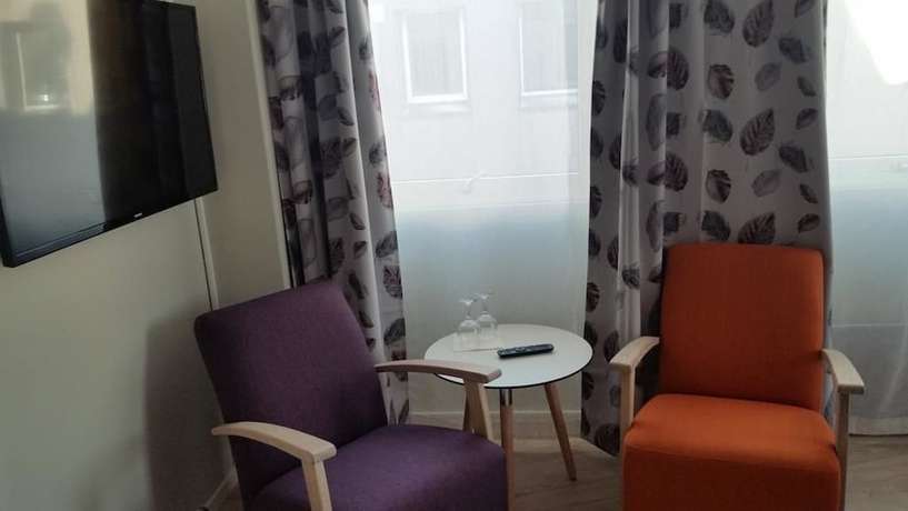 Imagen de la habitación del Hotel Cornerl. Foto 14