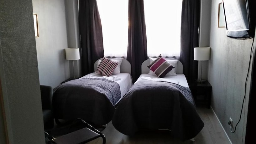 Imagen de la habitación del Hotel Cornerl. Foto 15