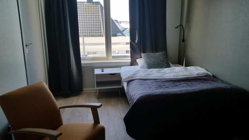 Imagen de la habitación del Hotel Cornerl. Foto 16
