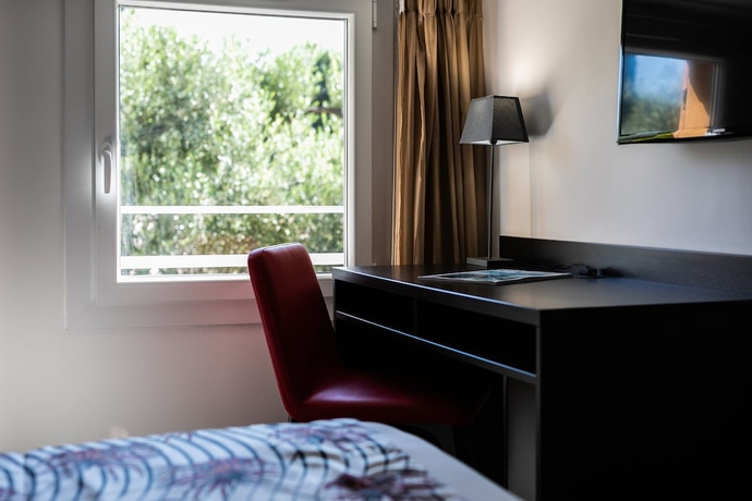 Imagen de la habitación del Hotel Corniche Du Liouquet. Foto 3