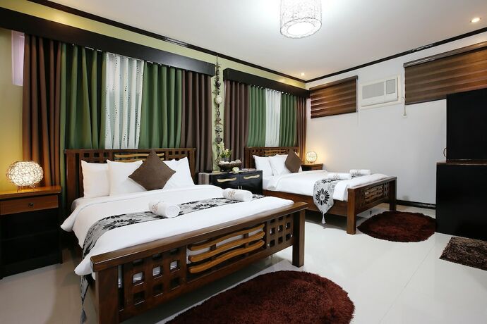 Imagen de la habitación del Hotel Coron Bancuang Mansion. Foto 19