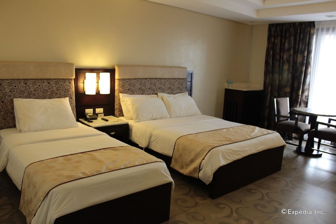 Imagen de la habitación del Hotel Coron Westown Resort. Foto 8