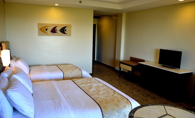 Imagen de la habitación del Hotel Coron Westown Resort. Foto 12