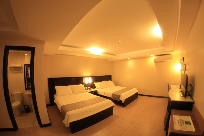 Imagen de la habitación del Hotel Coron Westown Resort. Foto 14