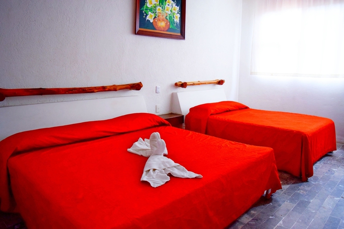 Imagen de la habitación del Hotel Corona Zihuatanejo. Foto 11