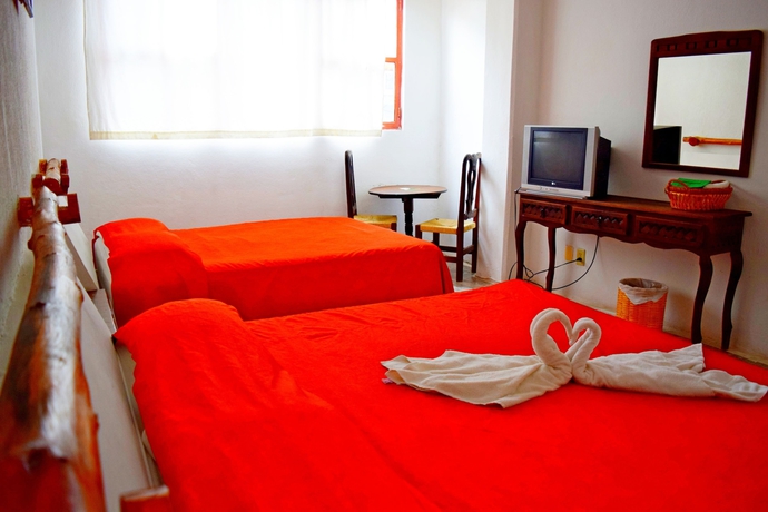 Imagen de la habitación del Hotel Corona Zihuatanejo. Foto 13