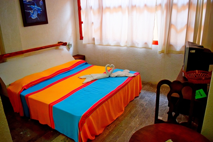 Imagen de la habitación del Hotel Corona Zihuatanejo. Foto 14