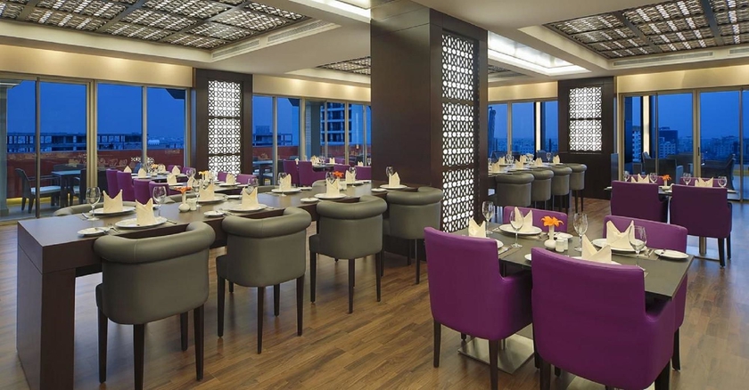 Imagen del bar/restaurante del Hotel Corp Amman. Foto 2