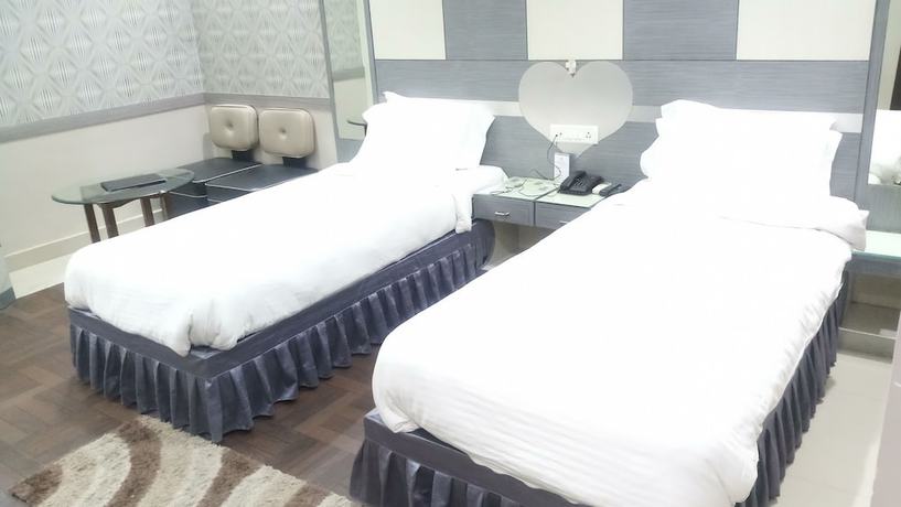 Imagen de la habitación del Hotel Corporate Inn, Patna. Foto 5