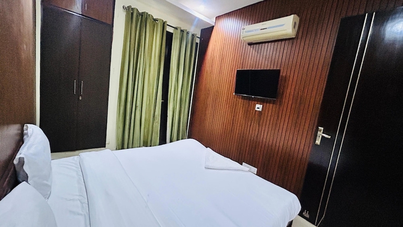 Imagen de la habitación del Hotel Corporate Stayz. Foto 3