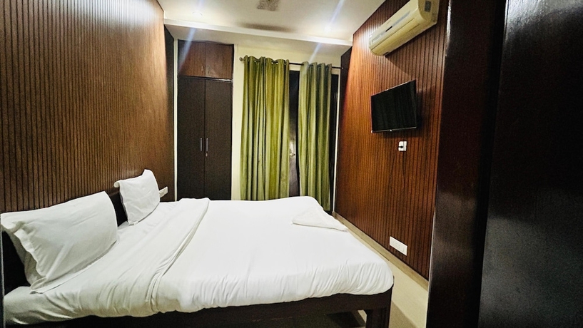 Imagen de la habitación del Hotel Corporate Stayz. Foto 5