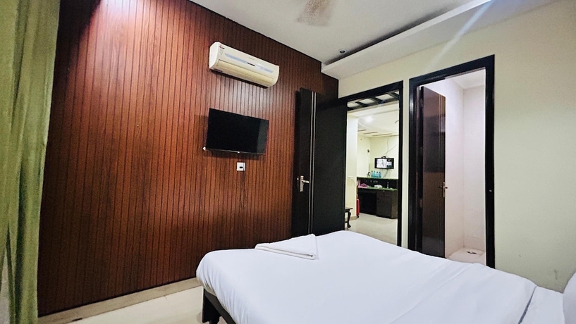 Imagen de la habitación del Hotel Corporate Stayz. Foto 6