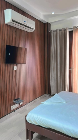 Imagen de la habitación del Hotel Corporate Stayz. Foto 9