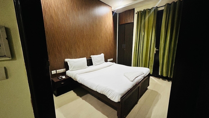 Imagen de la habitación del Hotel Corporate Stayz. Foto 10
