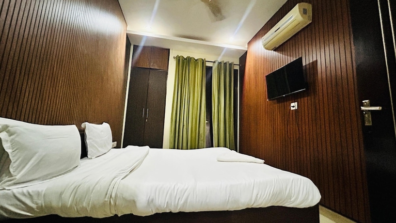 Imagen de la habitación del Hotel Corporate Stayz. Foto 11