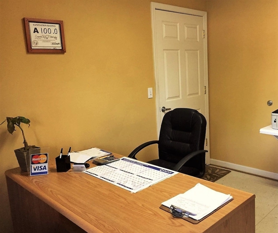 Imagen de los interiores del Hotel Corporate Suites Of Burlington. Foto 19