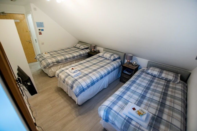 Imagen de la habitación del Hotel Corran Bunkhouse. Foto 14