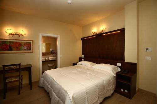 Imagen de la habitación del Hotel Corsignano. Foto 14