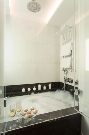 Imagen de la habitación del Hotel Corso 281 Luxury Suites Roma. Foto 4