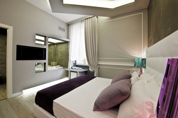 Imagen de la habitación del Hotel Corso Boutique Luxury Rooms. Foto 5